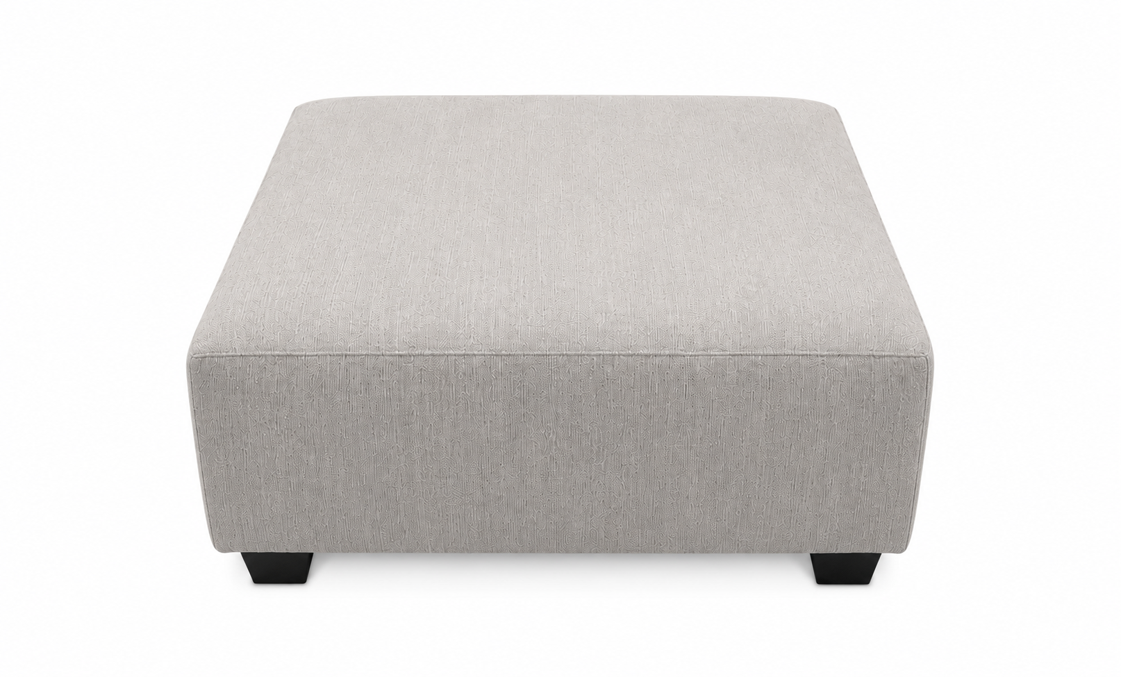 The #1099 Square Ottoman is a rectangular, light gray upholstered piece with short black block legs—a modern accent for any living space, ideal to pair with another ottoman on a white background.